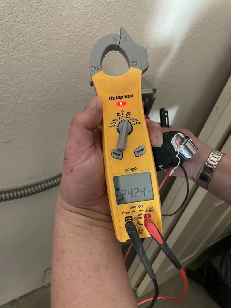 Voltage testing with clamp meter during Generator Installation in Gulf Gate